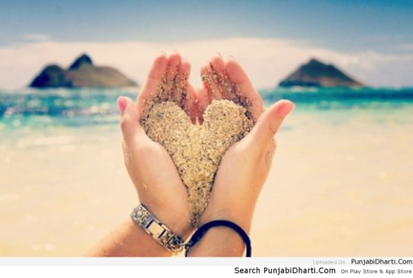 Sand heart in Hand | PunjabiDharti.Com